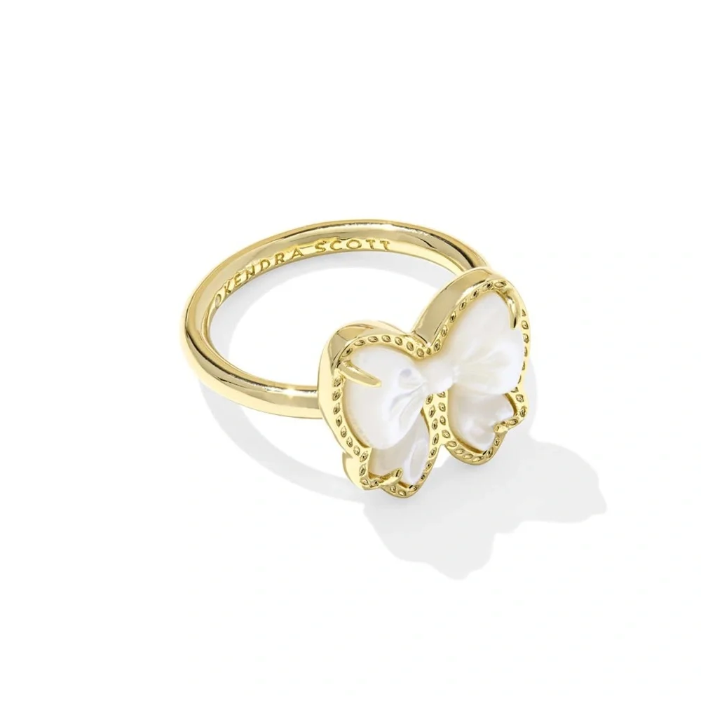 Kendra Scott Haley Bow Gold Band Ring in white. Size 7
